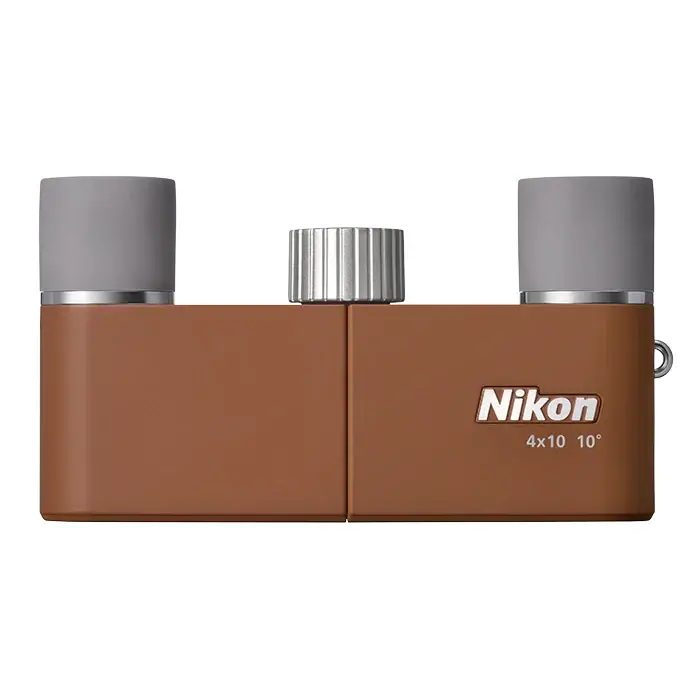Brown Nikon CF binoculars case with gray eyepieces on a white background