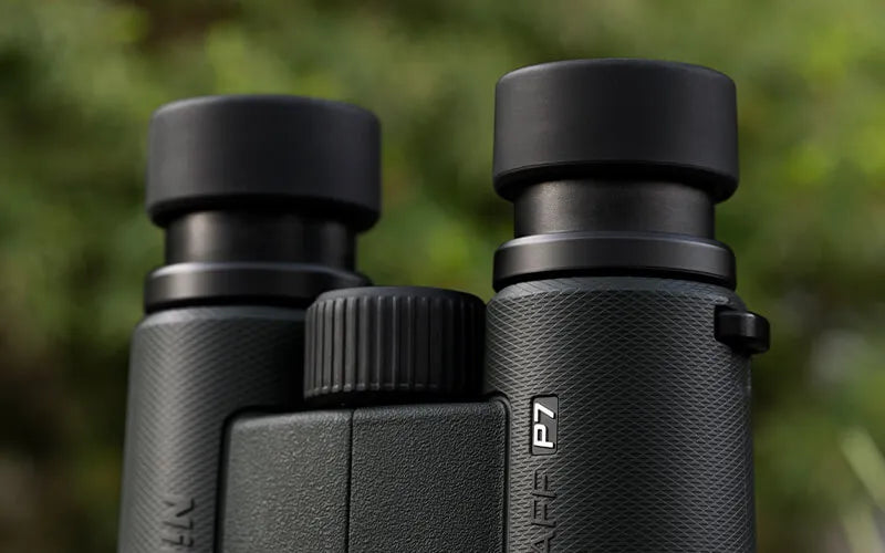 Nikon Prostaff P7 binoculars close-up highlighting the turn and slide eye-cups.