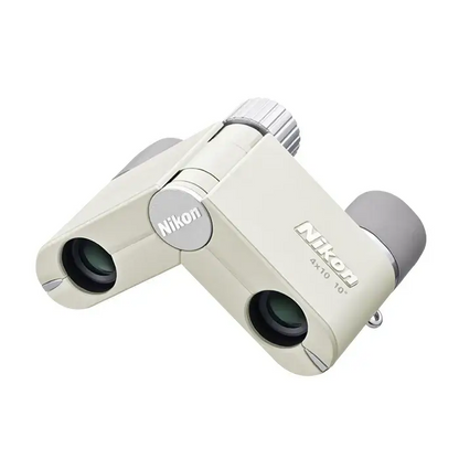 Top left view of Nikon 4x10 CF Binoculars showcasing their 90° fold feature in Ivory on a white background with grey eye cups.
