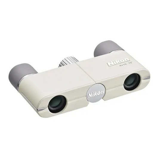 Top right view of Nikon 4x10 CF Binoculars in Ivory on a white background with grey eye cups.