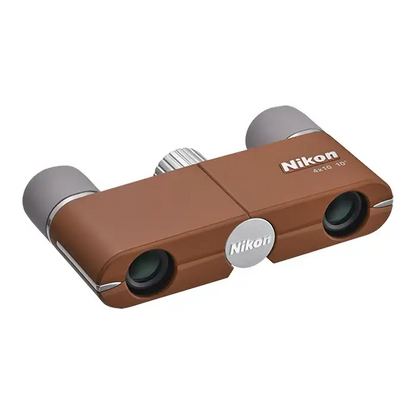 Top Left view of Nikon 4x10 CF Binoculars in brown on a white background with grey eye cups.