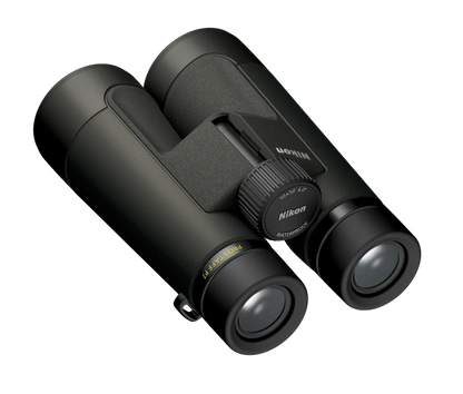 Black Nikon binoculars on a white background