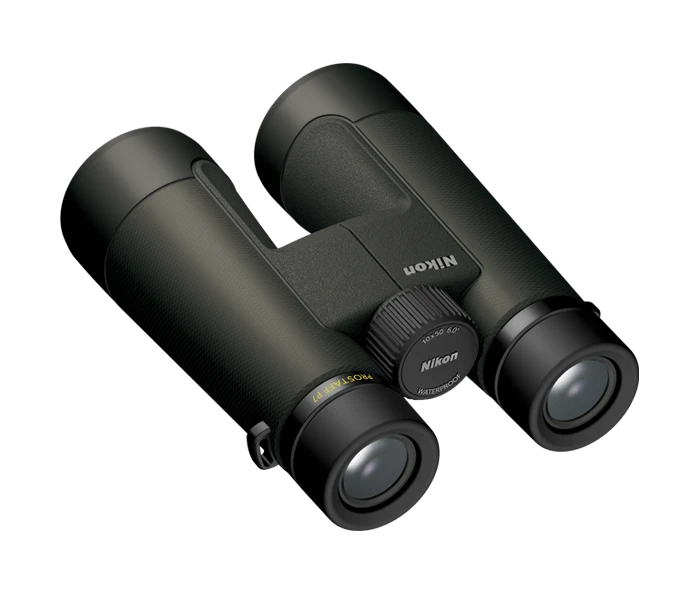 Black Nikon binoculars on a white background