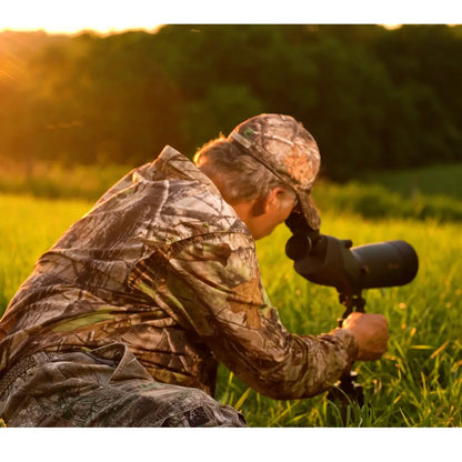 Man using the Shasta Ridge Waterproof Spotting Scope.