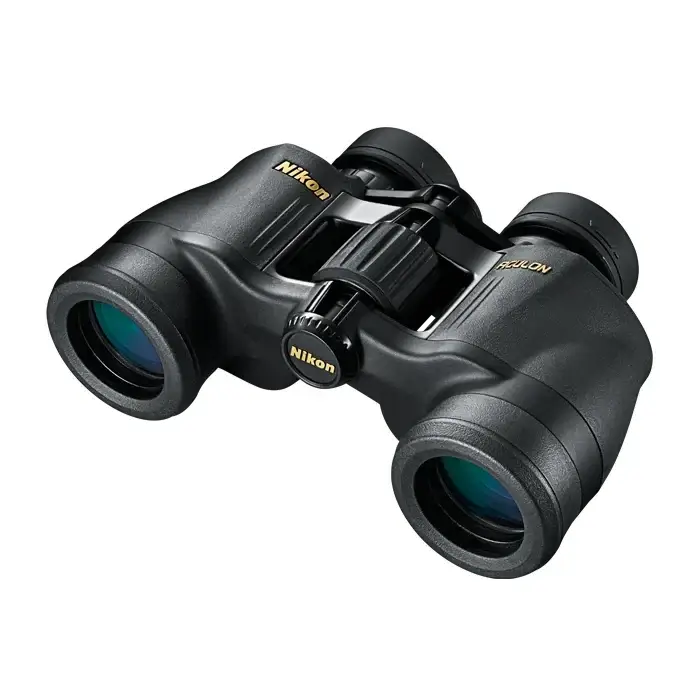 A pair of Nikon ACULON A211 7x35 binoculars with black rubber-armored coating and a central focus knob.