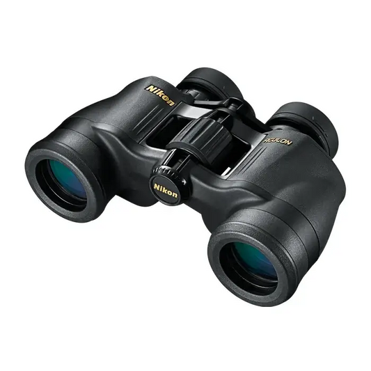 A pair of Nikon ACULON A211 7x35 binoculars with black rubber-armored coating and a central focus knob.