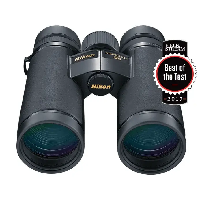 Top front view of the Nikon Monarch HG 10x42 Binoculars with the 2017 Field and Stream Best of the Test winning badge on a white background.