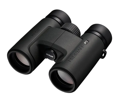 Black Nikon binoculars on a white background