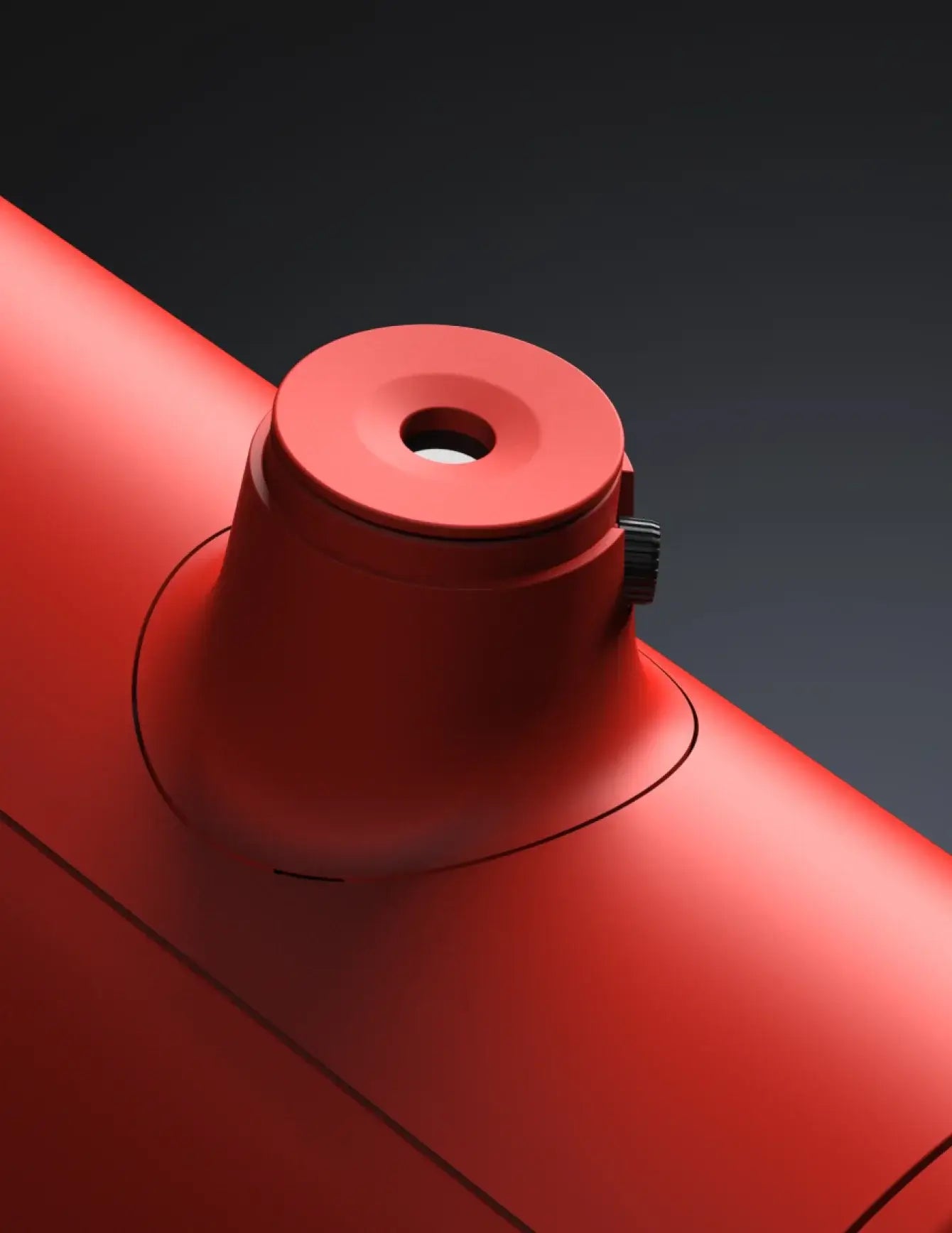 Close-up of a Unistellar Telescope with a black knob on a dark background