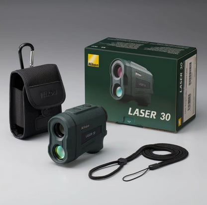 Nikon Laser 30 rangefinder with carrying case and box on a gray background